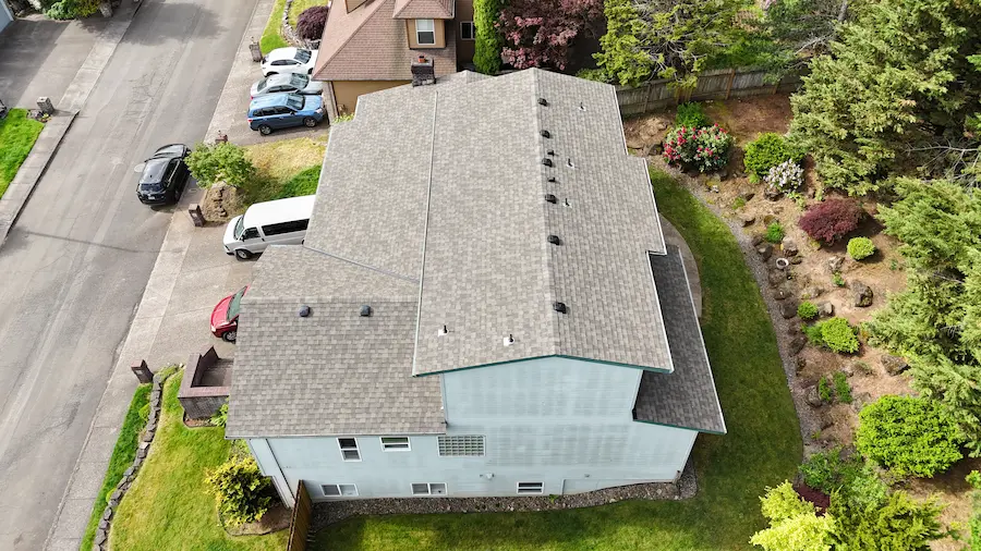 New asphalt shingle roof installed on a two-story home in a Clackamas neighborhood