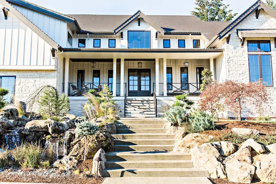 The front of a home in Clackamas, Oregon with a new architectural shingle roof installed.