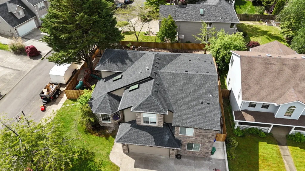 roofing contractors aloha multilevel house with giant tree scaled